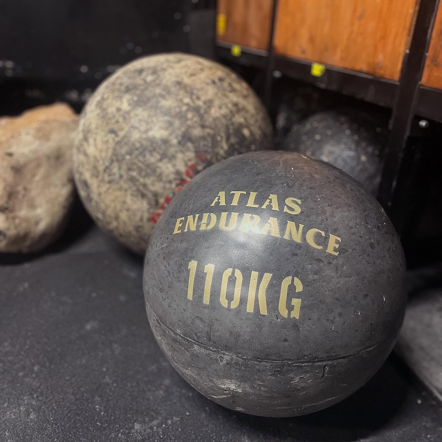 A 110kg Atlas stone on the gym floor at The Powerbuilding
