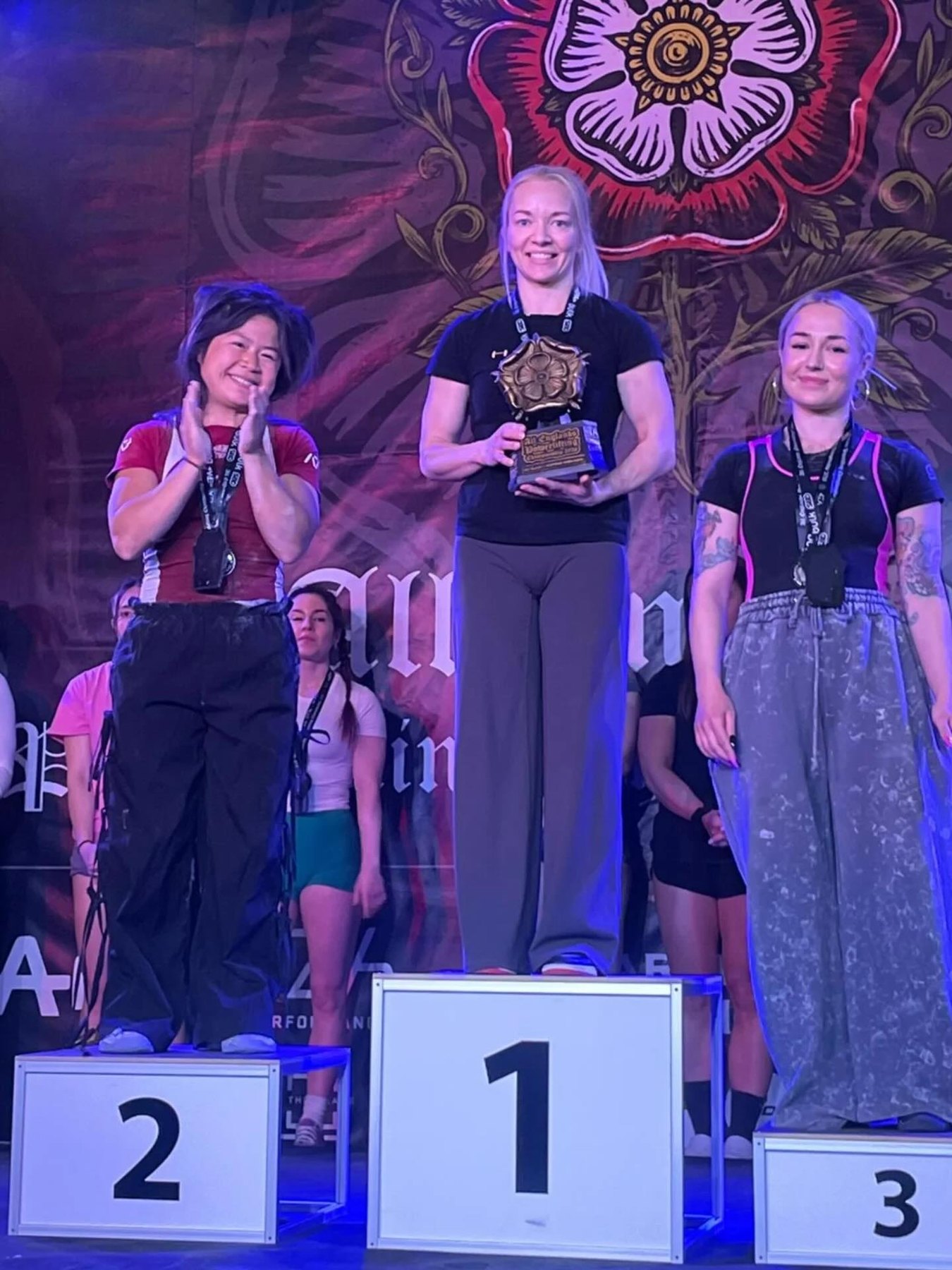Leoni Tatman on the first-place podium at the English Championships